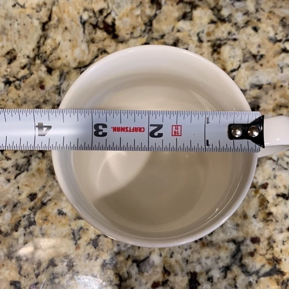 We Proudly Brew Starbucks coffee mug 12 ounces White and green